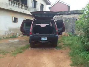 🚙 2002 Nissan Xterra Red SUV | Available in Ikotun - Low Mileage & Spacious - Image 3
