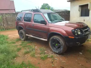 🚙 2002 Nissan Xterra Red SUV | Available in Ikotun - Low Mileage & Spacious - Image 4