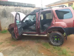 🚙 2002 Nissan Xterra Red SUV | Available in Ikotun - Low Mileage & Spacious - Image 5