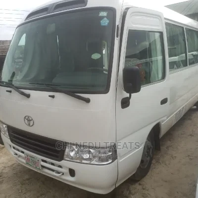 🚐 2014 Toyota Coaster Spacious Minibus | Available in Port Harcourt - Well-Maintained & Fuel Efficient