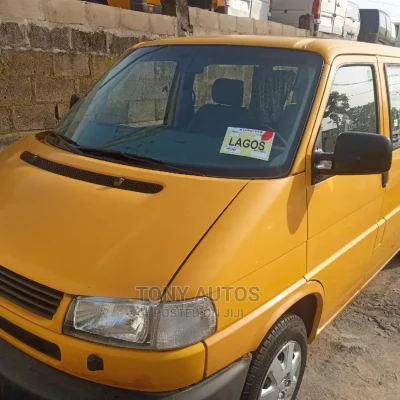 🚐 2004 Volkswagen Transporter | Spacious Yellow Bus in Lagos - Low Mileage & Dependable