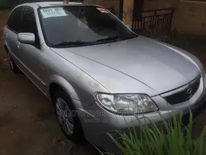 🚗 2003 Mazda 323 Compact Sedan | Available in Offa - Low Mileage & Spacious - Image 4