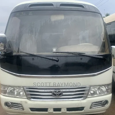 🚐 2015 Toyota Coaster Spacious Van | Available in Lagos - Great Fuel Efficiency & Low Mileage