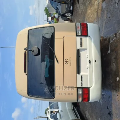 🚐 2006 Toyota Coaster Spacious Minibus | Available in Ajah - Well-Maintained & Ready